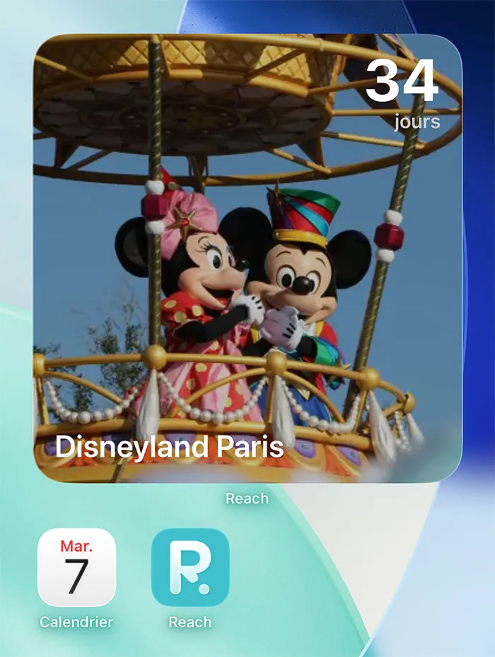 Widget compte à rebours Disney sur écran d'accueil iPhone montrant Disneyland Paris avec 34 jours restants